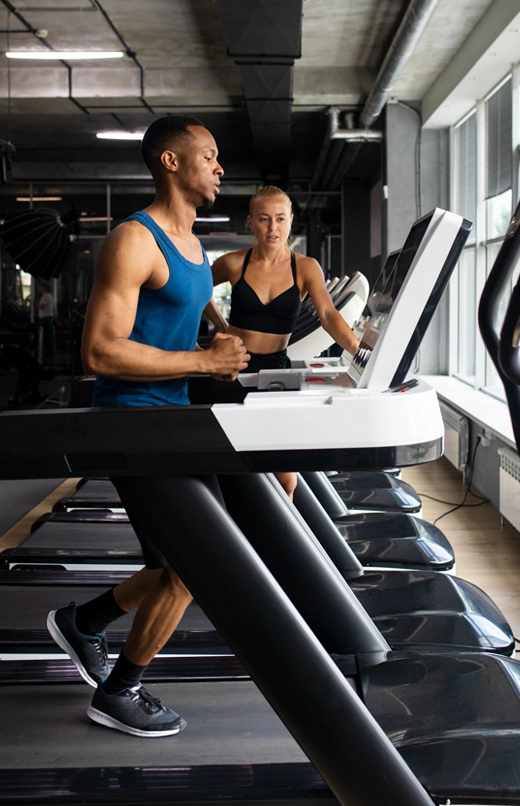 Gym members working out together.